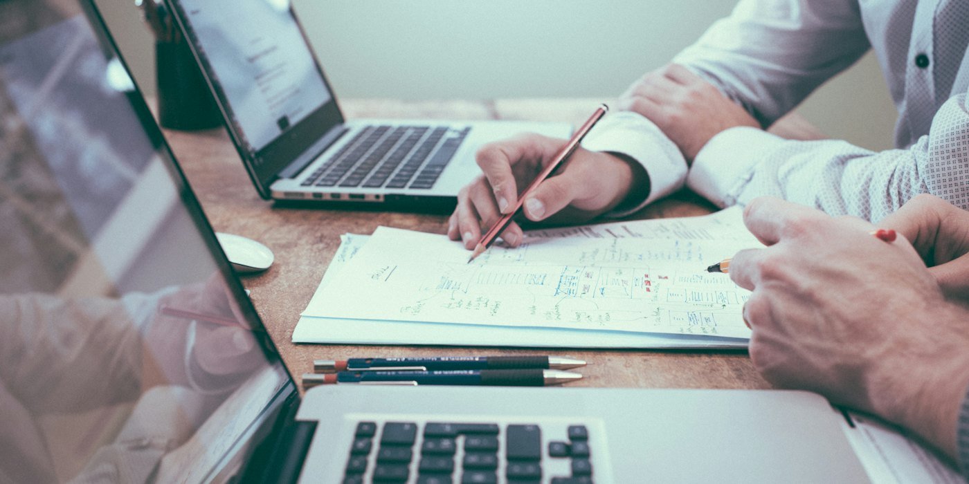 Business travel planning at a desk