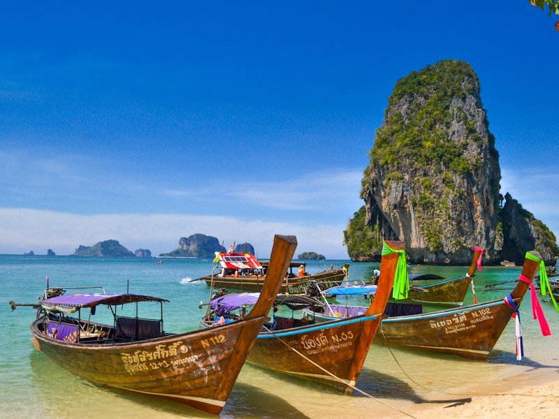 Longtail boats on a beach in Krabi